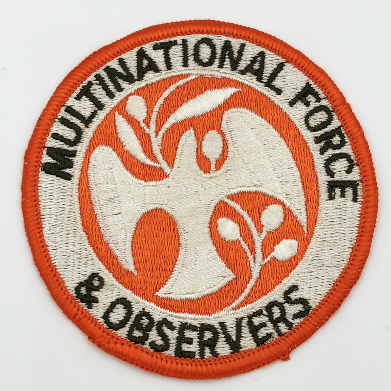 MULTI NATIONAL FORCE AND OBSERVERS PEACE DOVE PIN 1 inch 